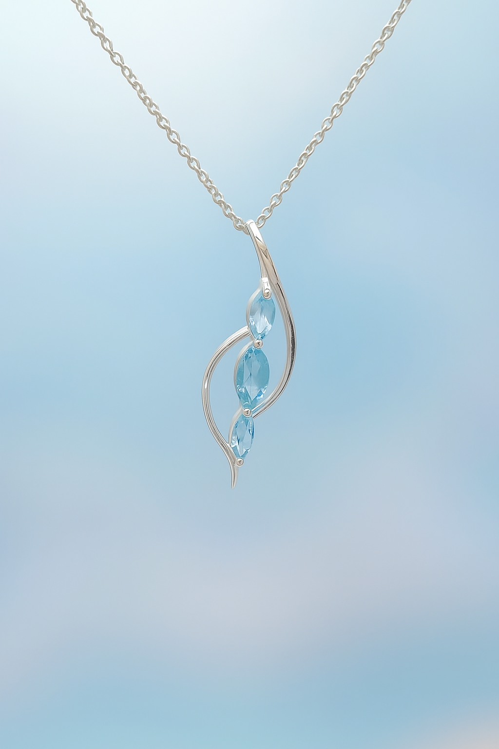 Sterling Silver Double Curve Blue Topaz Pendant Necklace – 18” Trace Chain