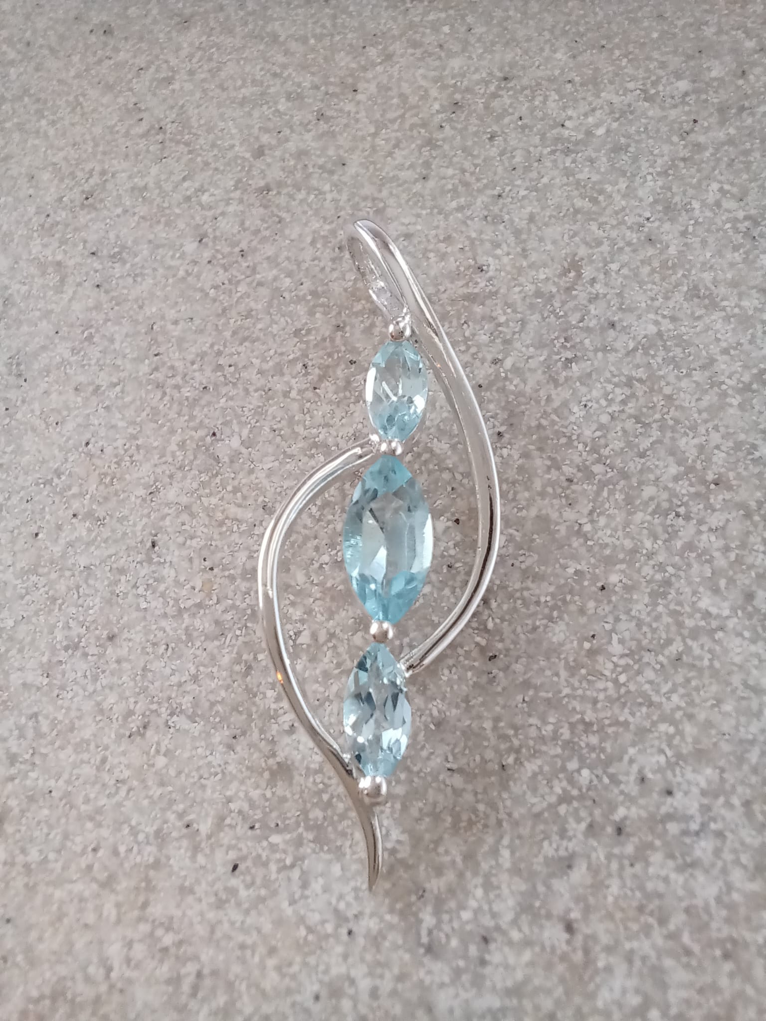 Sterling Silver Double Curve Blue Topaz Pendant Necklace – 18” Trace Chain