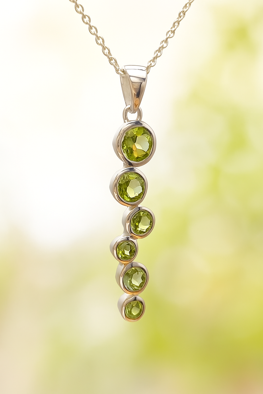 Sterling Silver Staggered Peridot Pendant Necklace – 18” Trace Chain