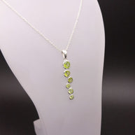 Sterling Silver Staggered Peridot Pendant Necklace – 18” Trace Chain