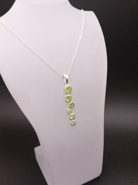 Sterling Silver Staggered Peridot Pendant Necklace – 18” Trace Chain