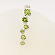 Sterling Silver Staggered Peridot Pendant Necklace – 18” Trace Chain